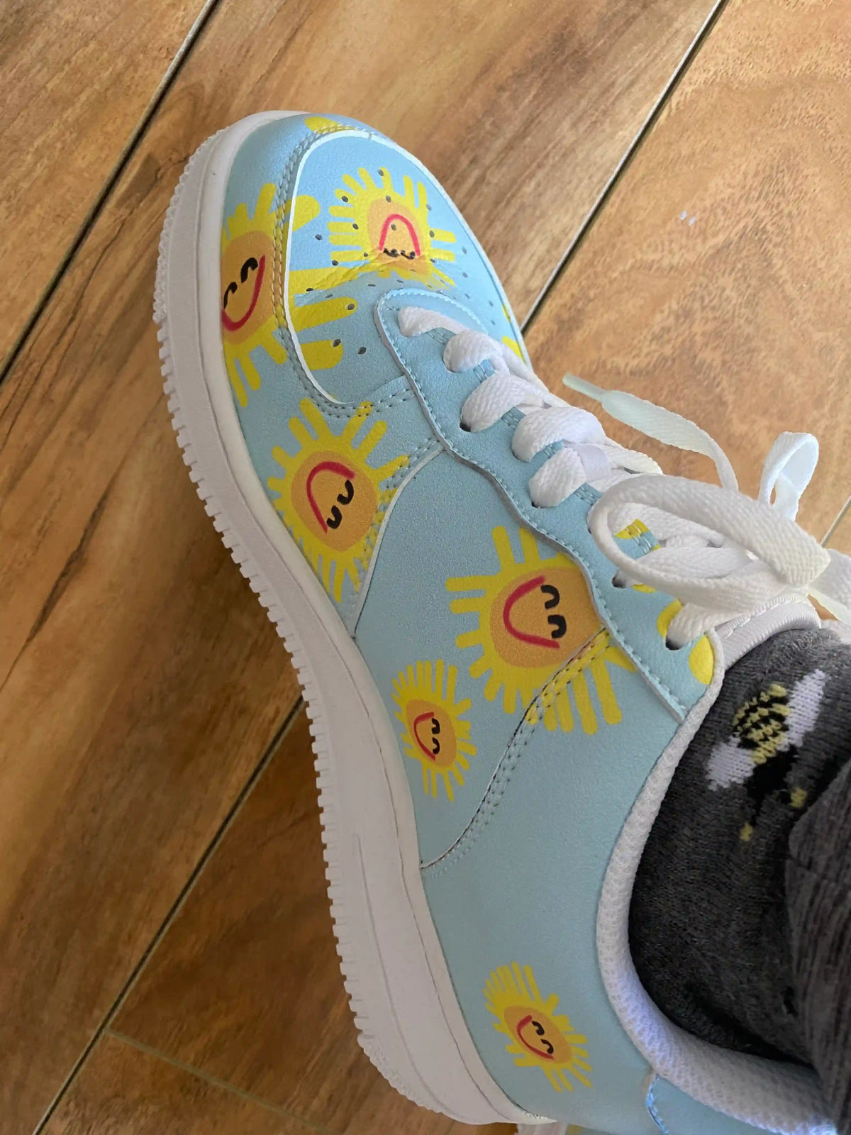 base zero light blue sun print closeup